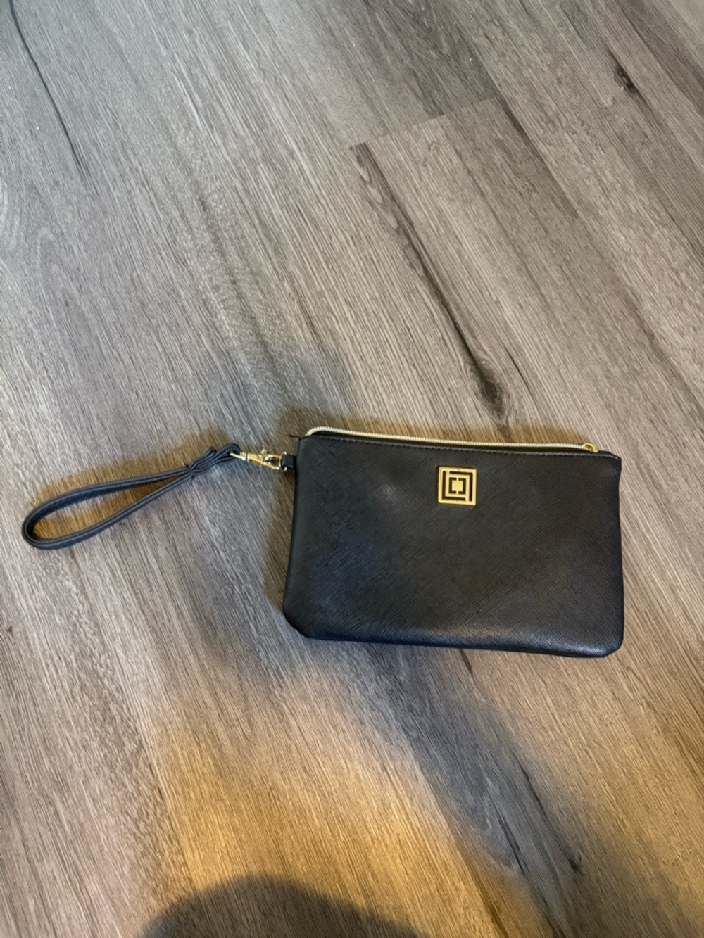 Black chargeable Wristlet Clutch with Gold Logo Accent